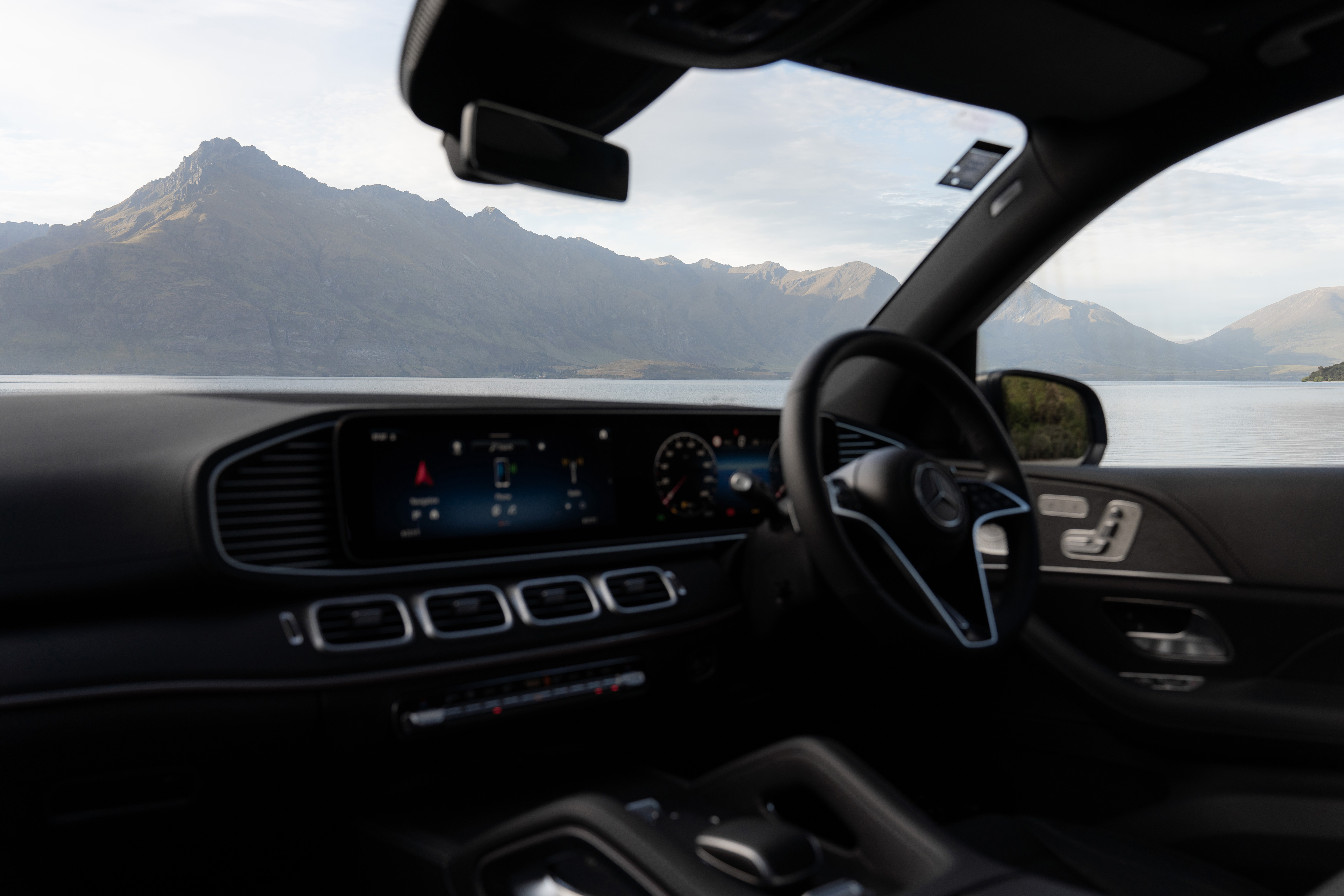 Mercedes-Benz dashboard. Image credit/photographer: Andrei Diomidov A car dashboard with a view of the mountains.