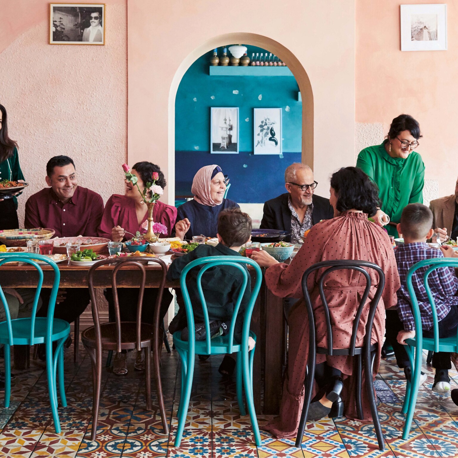 The Ayubi family dining at their restaurant Parwana in Adelaide.