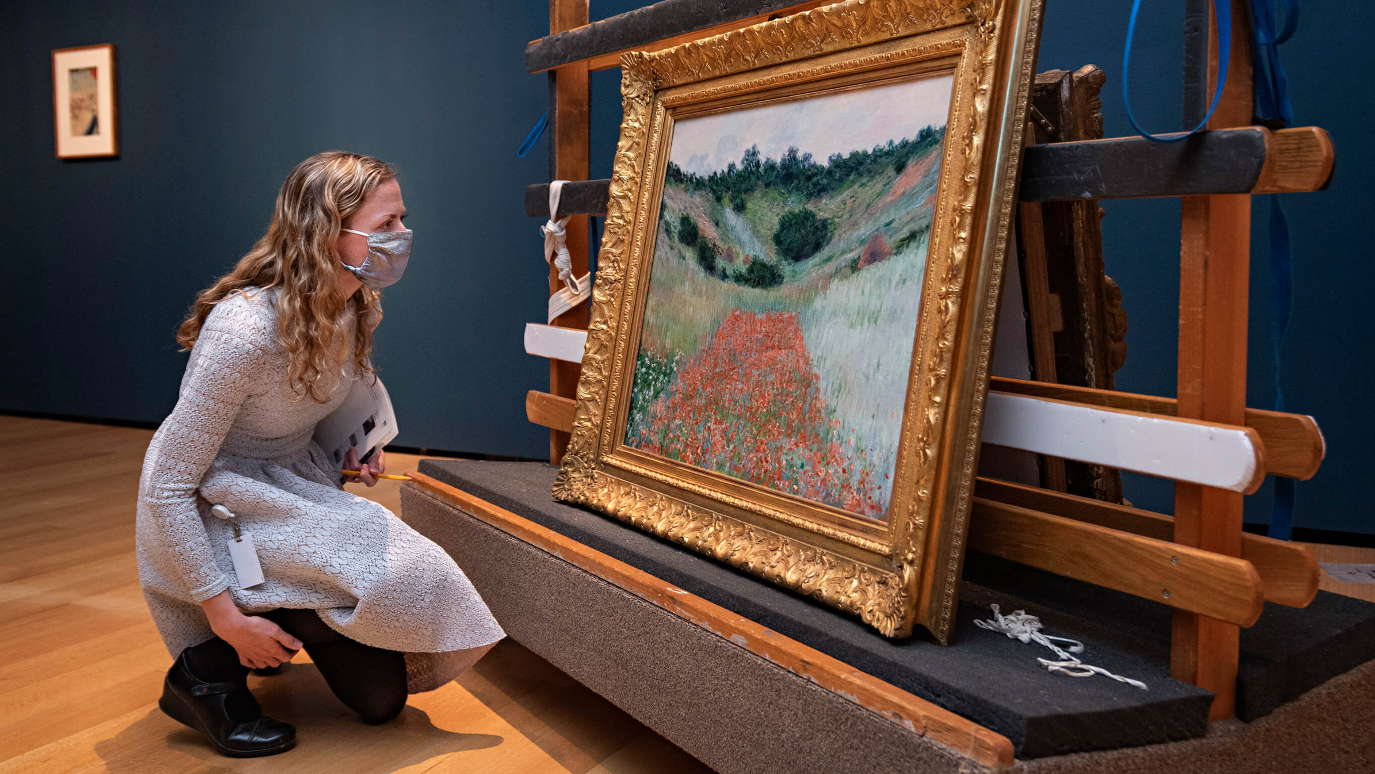 NGV 2 Curators inspect French Impressionist works at the Museum of Fine Arts, Boston.