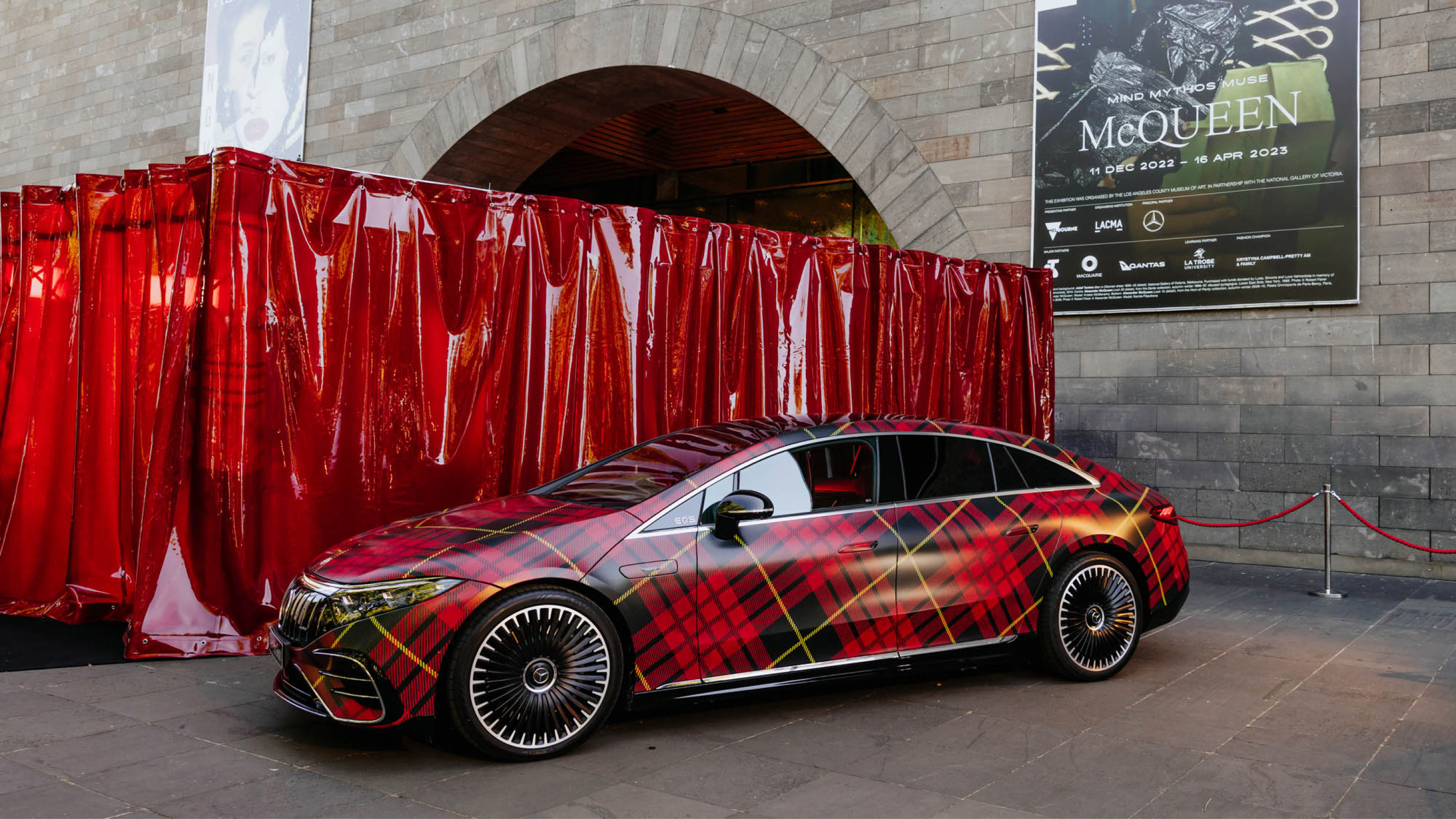 Mercedes-AMG EQS 53 4MATIC+ wrapped in McQueen’s signature tartan. Mercedes-AMG EQS 53 4MATIC+ wrapped in McQueen’s signature tartan.