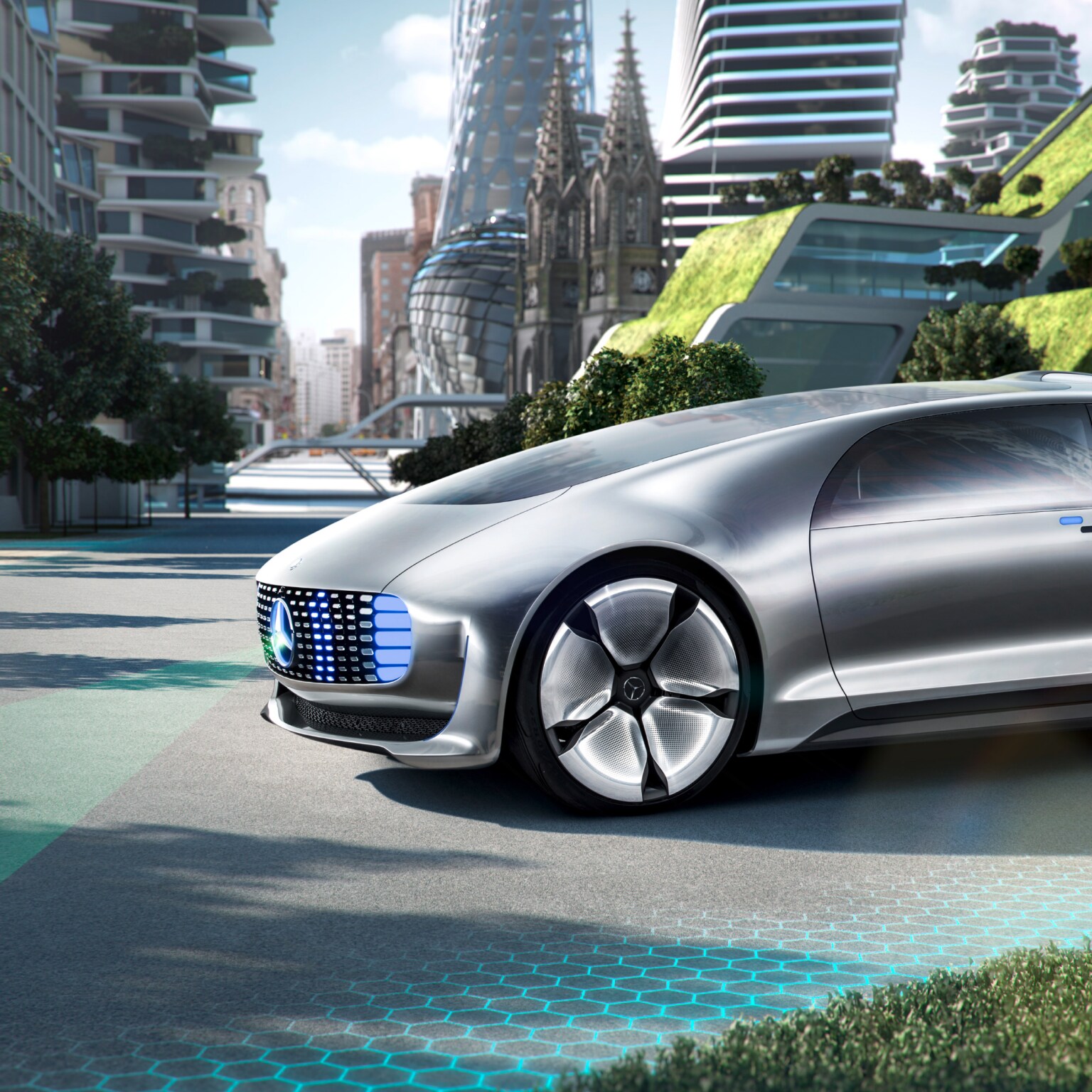The Mercedes-Benz F 015 concept car projecting a pedestrian crossing on the road as a person walks in front of the car 