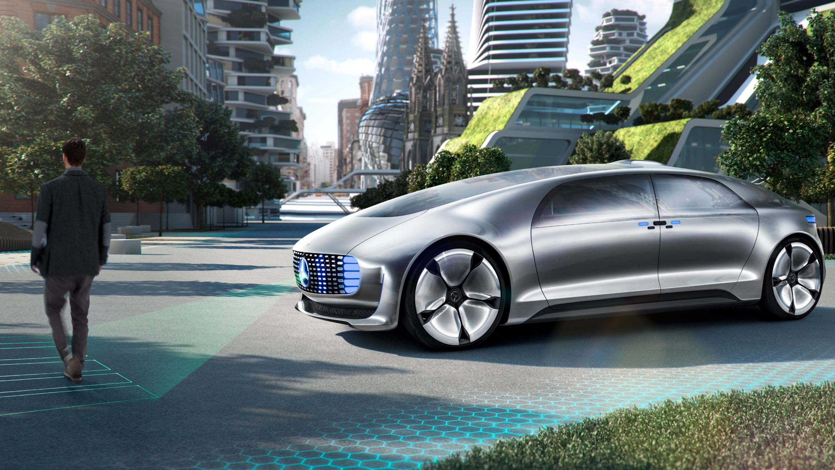 Mercedes-Benz F 015 concept car The Mercedes-Benz F 015 concept car projecting a pedestrian crossing on the road as a person walks in front of the car