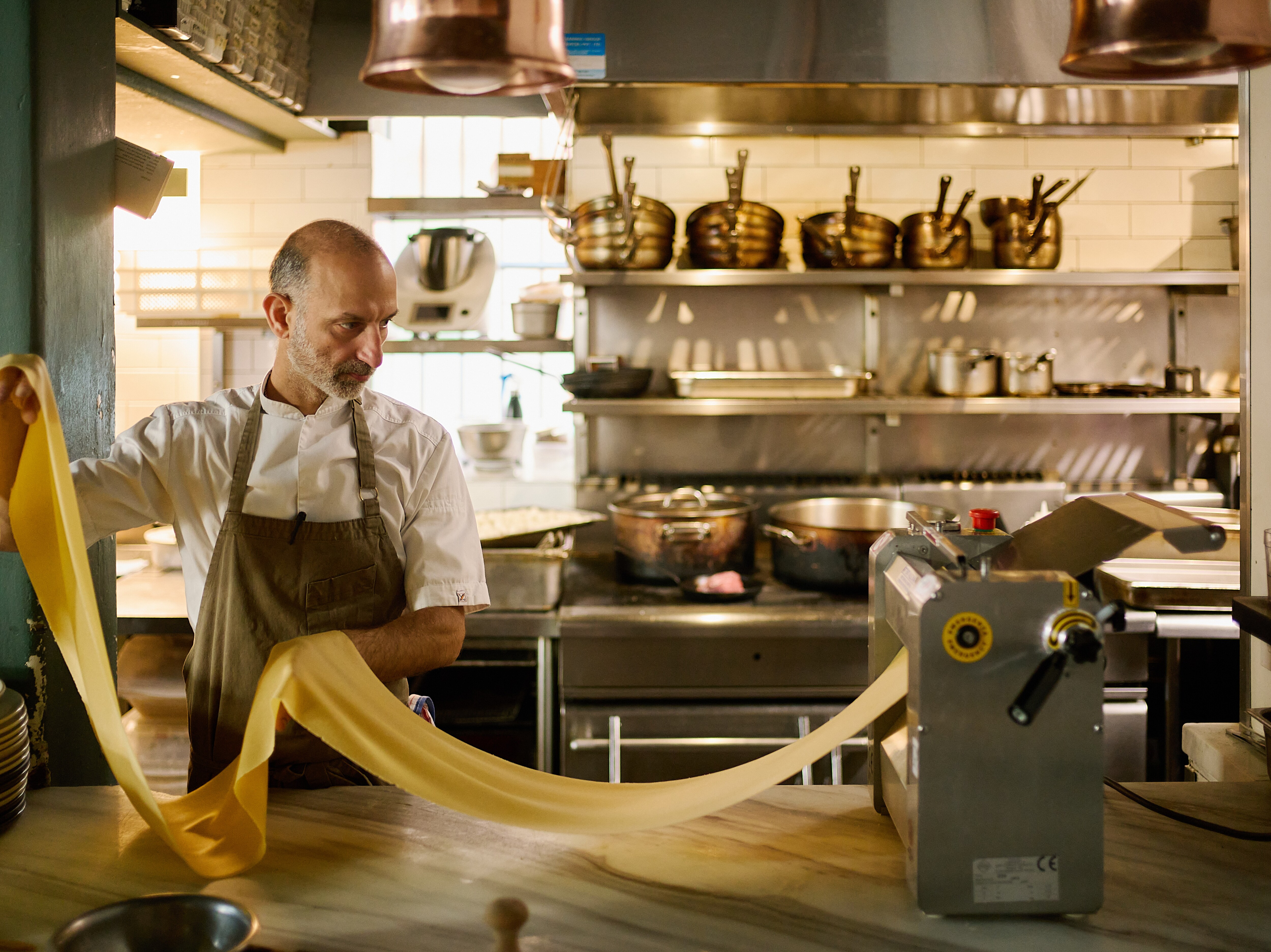 Chef Andreas Papadakis making pasta by hand