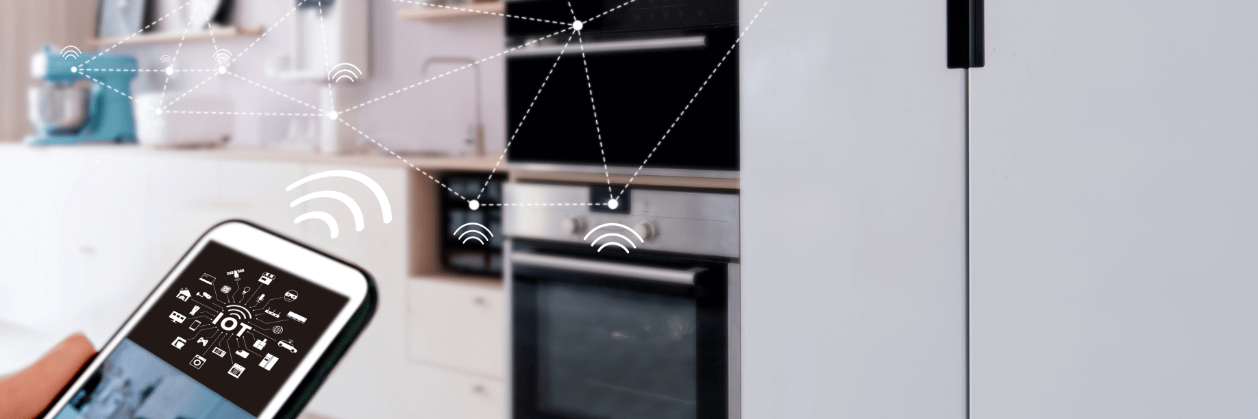 The best smart home technology of 2020 Someone holding a mobile phone to control smart devices in their kitchen