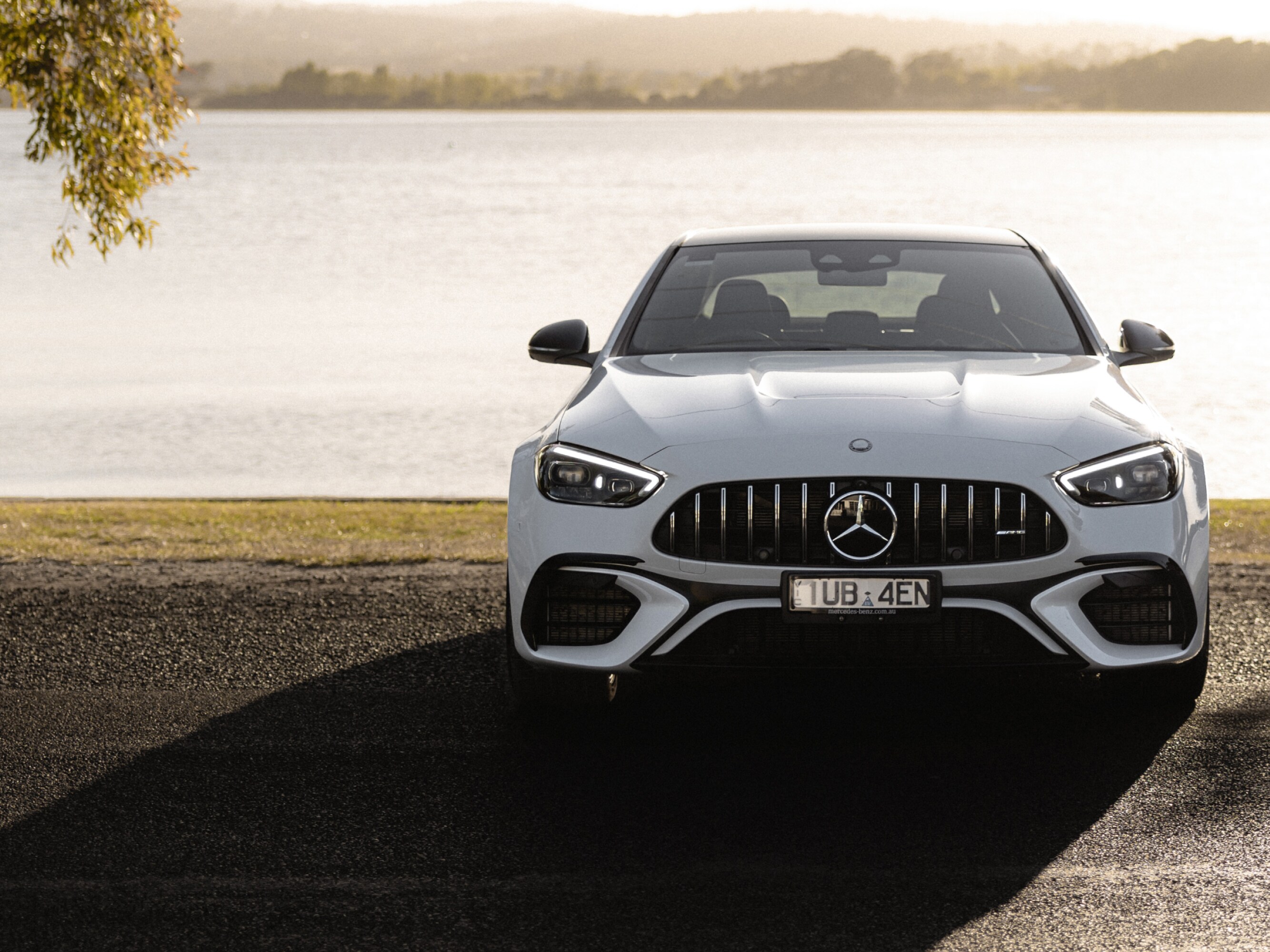 A white Mercedes-AMG C 63 S E PERFORMANCE. 