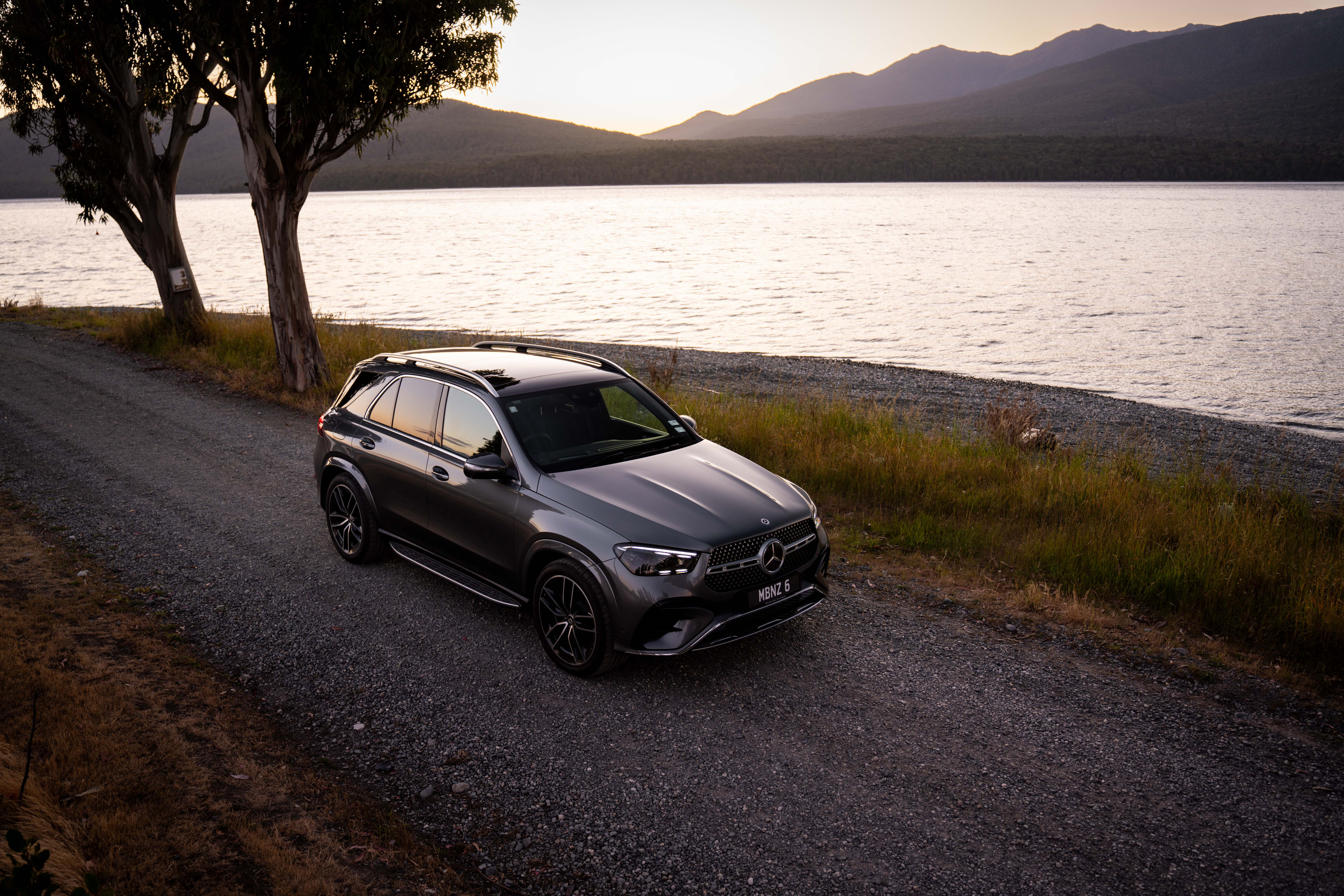 A Mercedes-Benz GLE SUV driving on a road A Mercedes-Benz GLE SUV driving on a road
