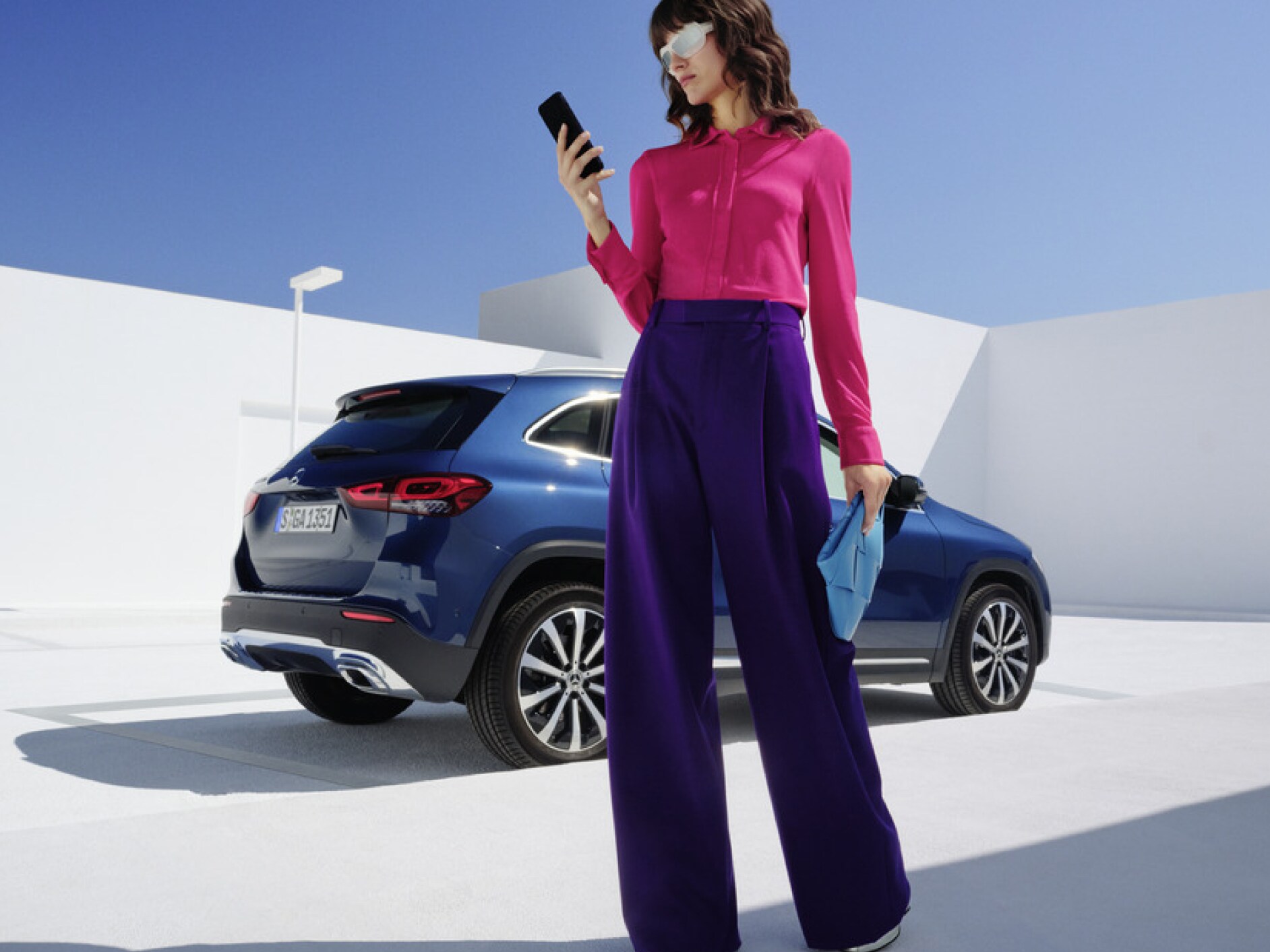 A woman holding a mobile phone