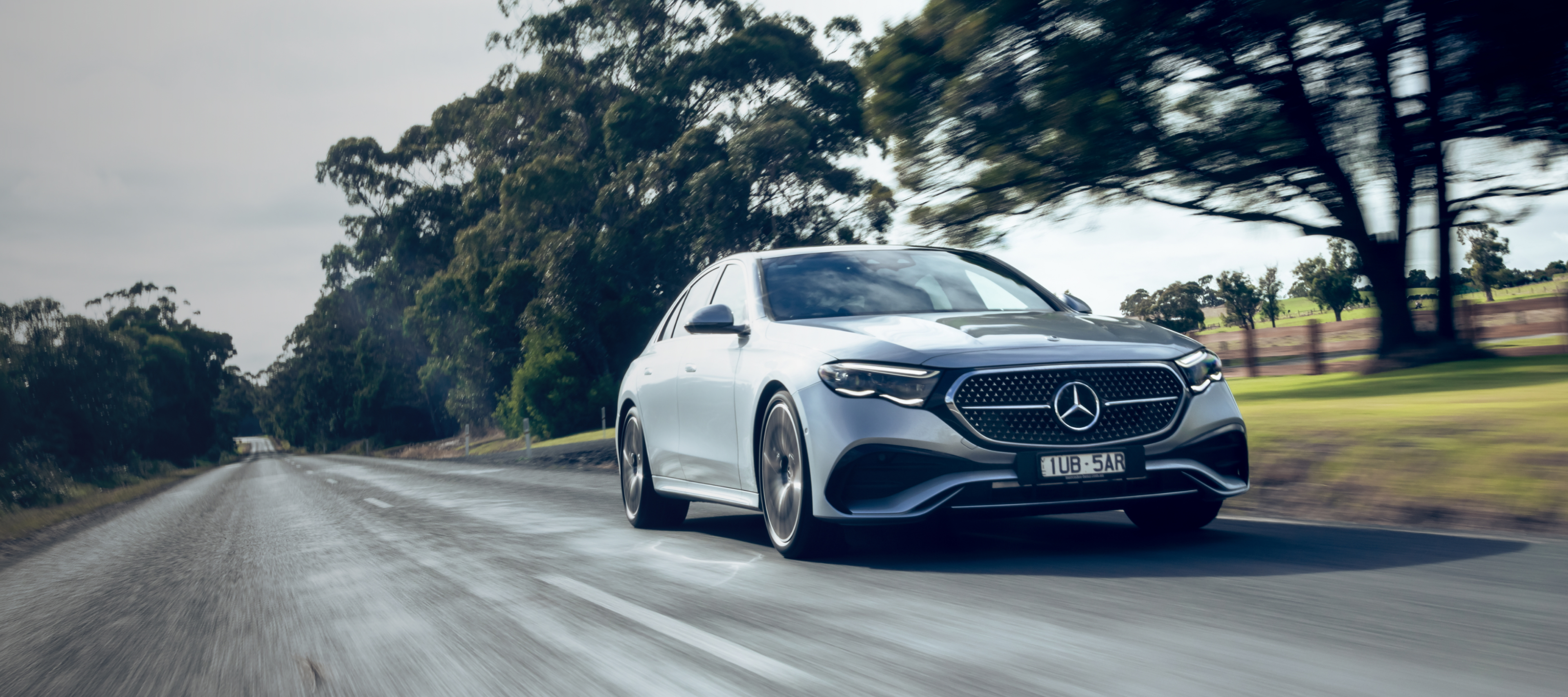 Mercedes-Benz E-Class Sedan Mercedes-Benz E-Class Sedan driving on a road