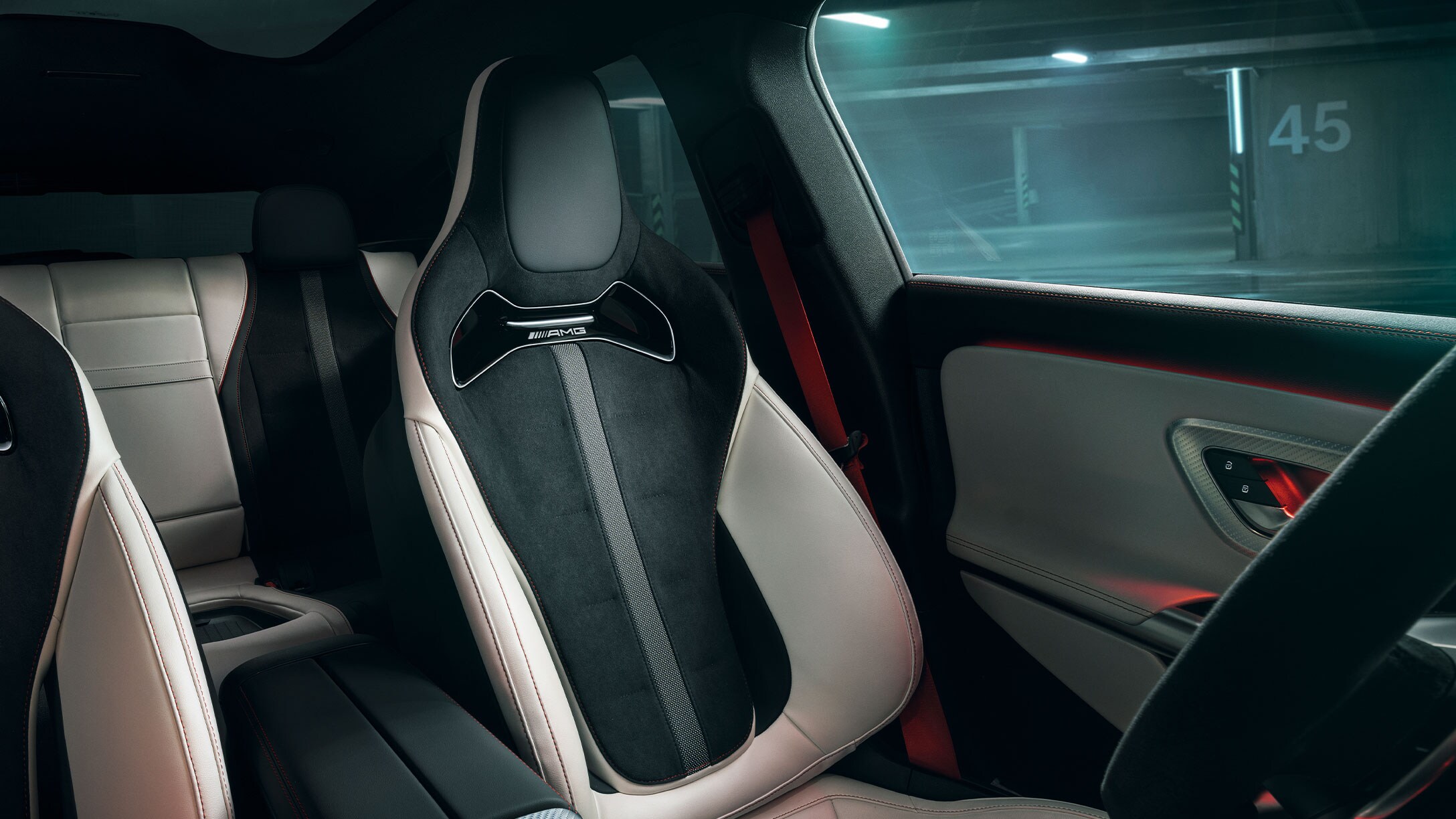 The all-new Mercedes-AMG CLA 45 electric 4MATIC+ with red seat belts.