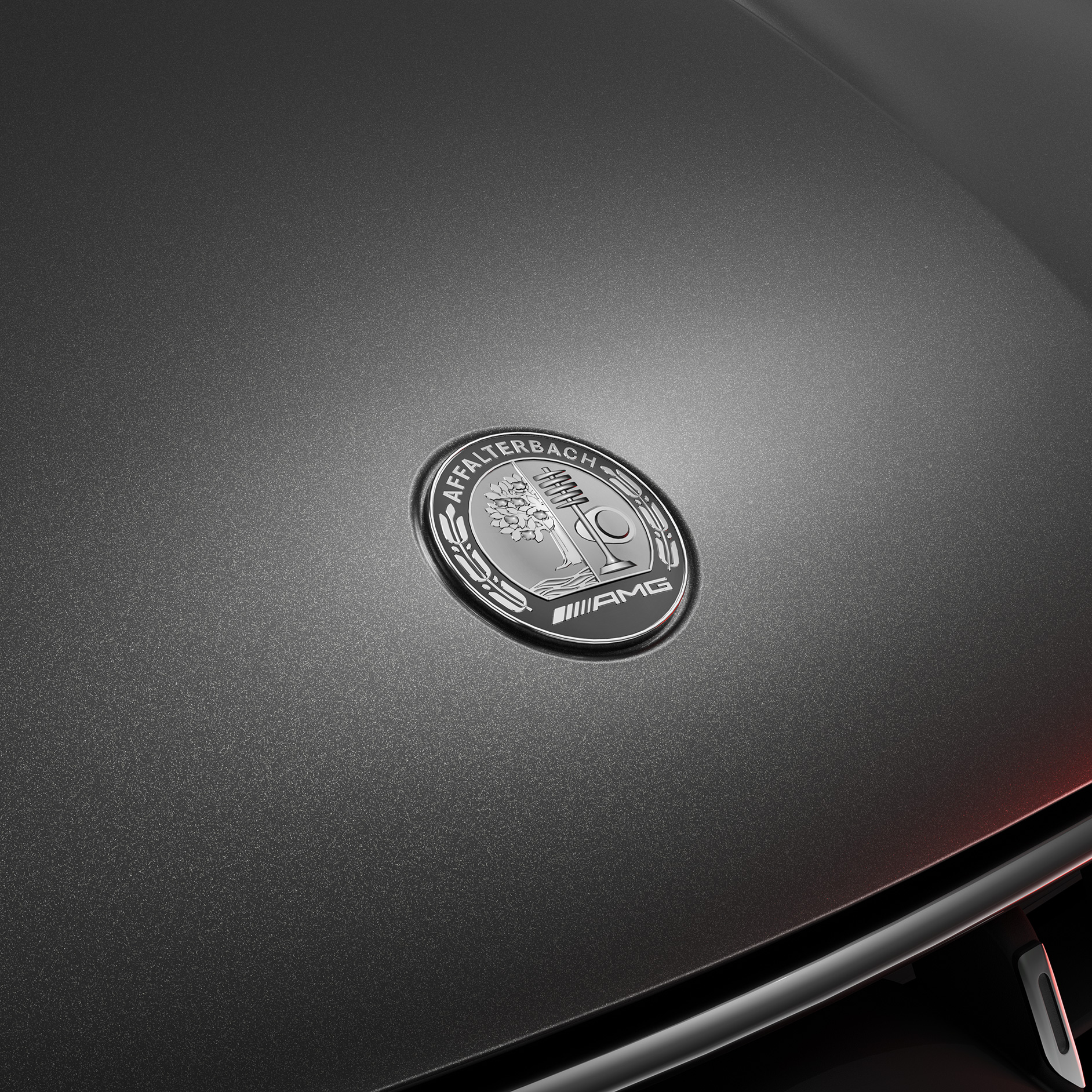 AMG Private Lounge | Mercedes-AMG A side view of a Mercedes-AMG vehicle.