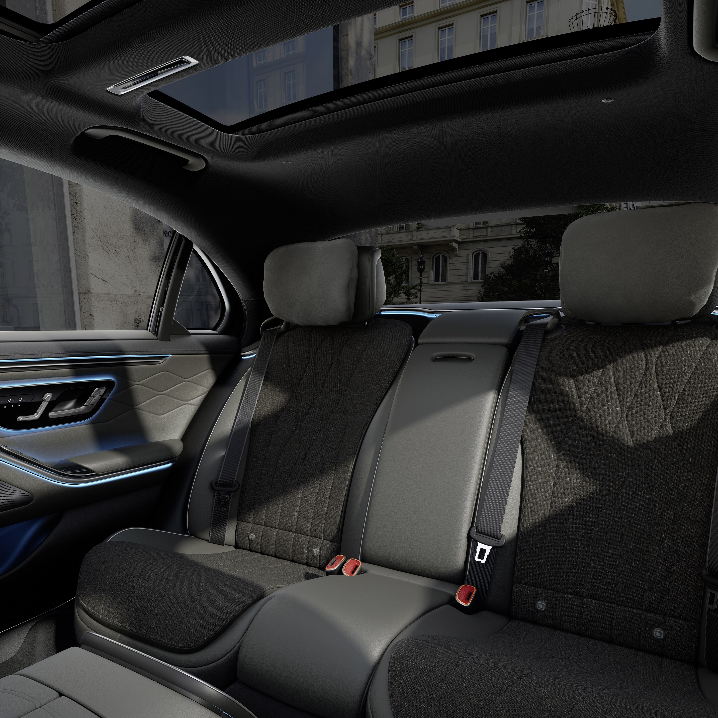 The cockpit of the new Mercedes-Benz Saloon shown from between the two front seats.