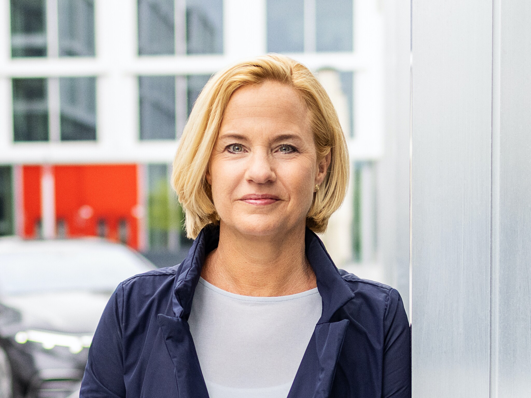 The image shows Britta Seeger, Board Member for Sales, Mercedes-Benz Cars.