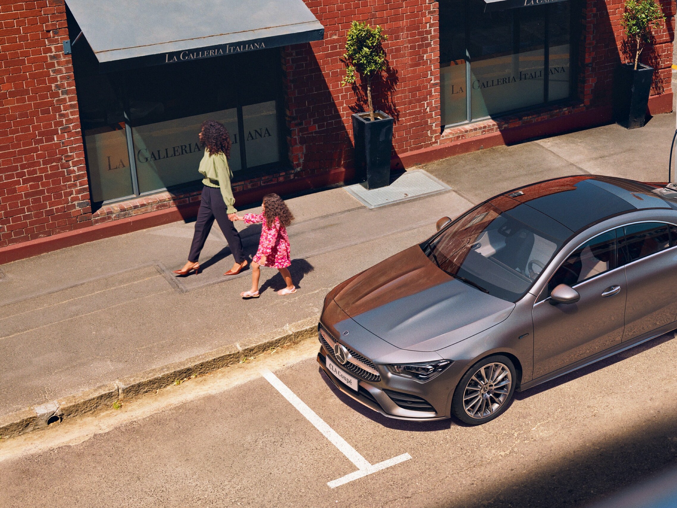 A Mercedes-Benz charges at an IONITY fast charging station via Mercedes me Charge.