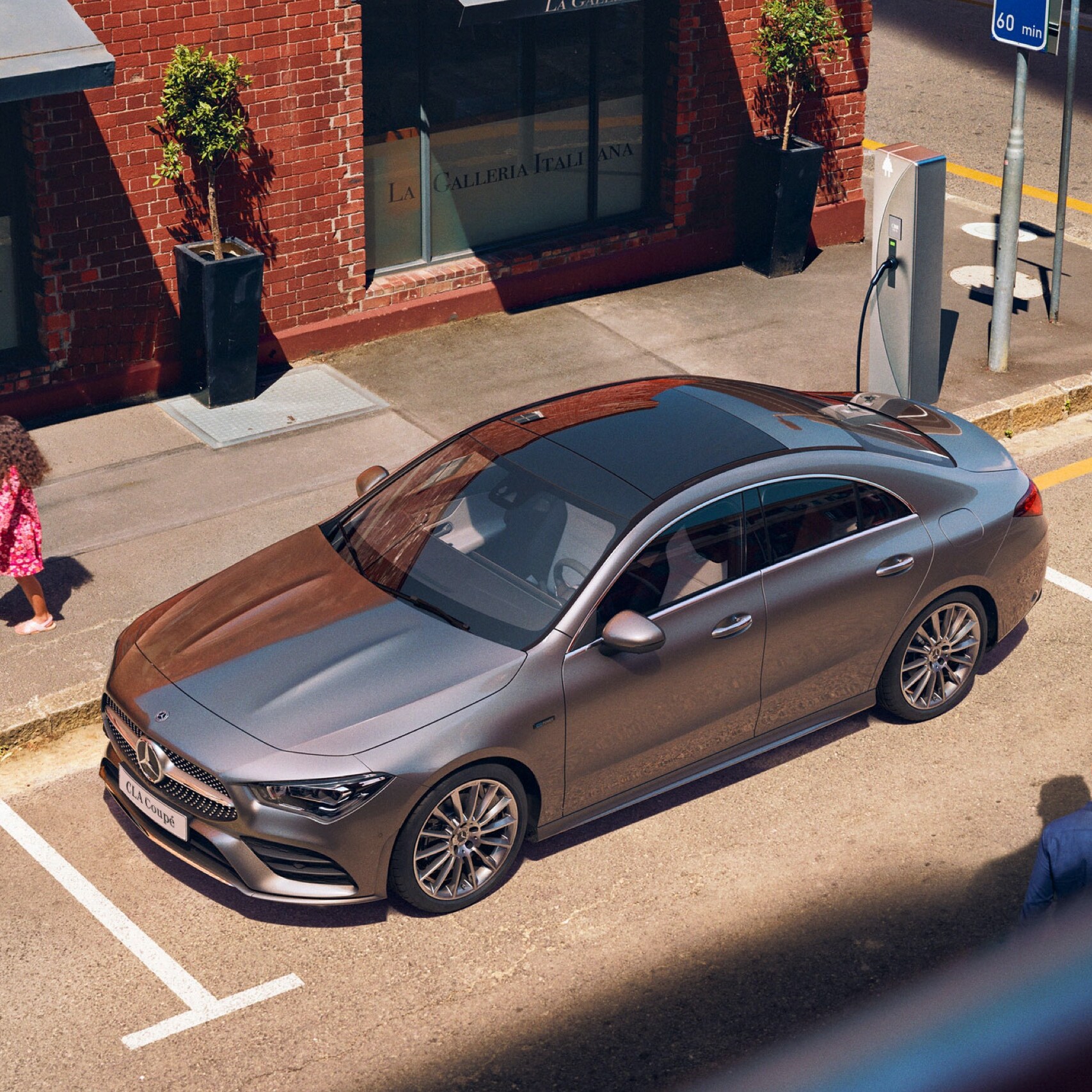 A Mercedes-Benz charges at an IONITY fast charging station via Mercedes me Charge.