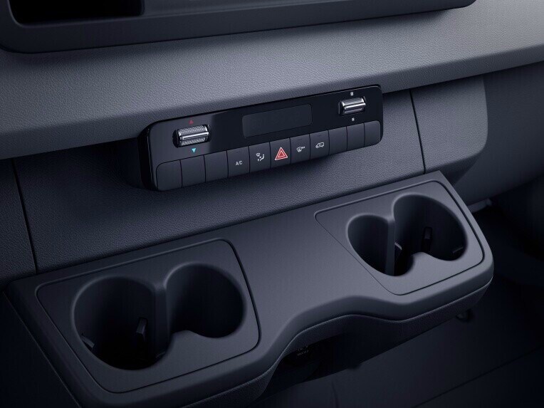 The cupholders in the centre console hold cups, bottles or cans and keep them in place while on the move.