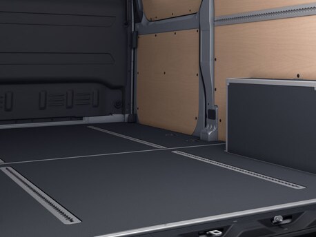 The load anchoring system for the wood floor in the load compartment consists of 2 load anchoring rails bolted to the floor.