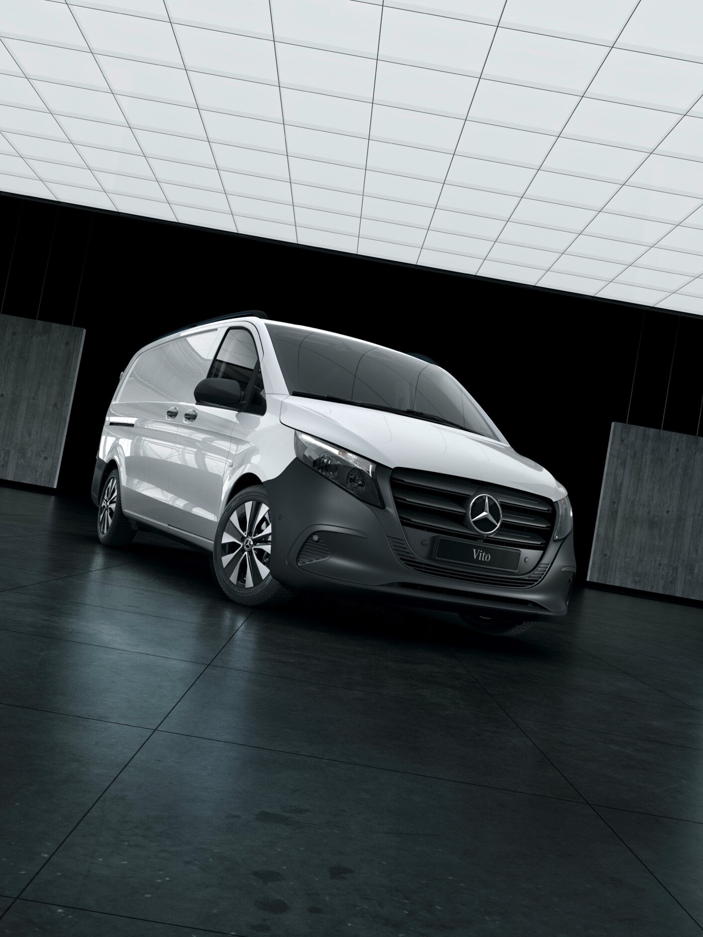 The Mercedes-Benz Vito panel van stands in a warehouse surrounded by concrete walls.