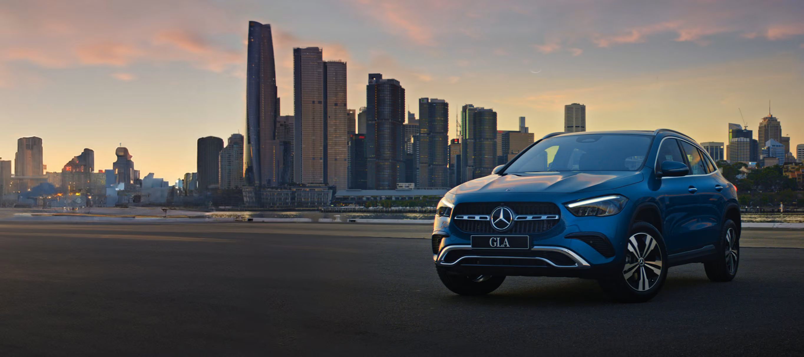 GLA City Edition GLA City Edition SUV depict in front of a city background during sunset