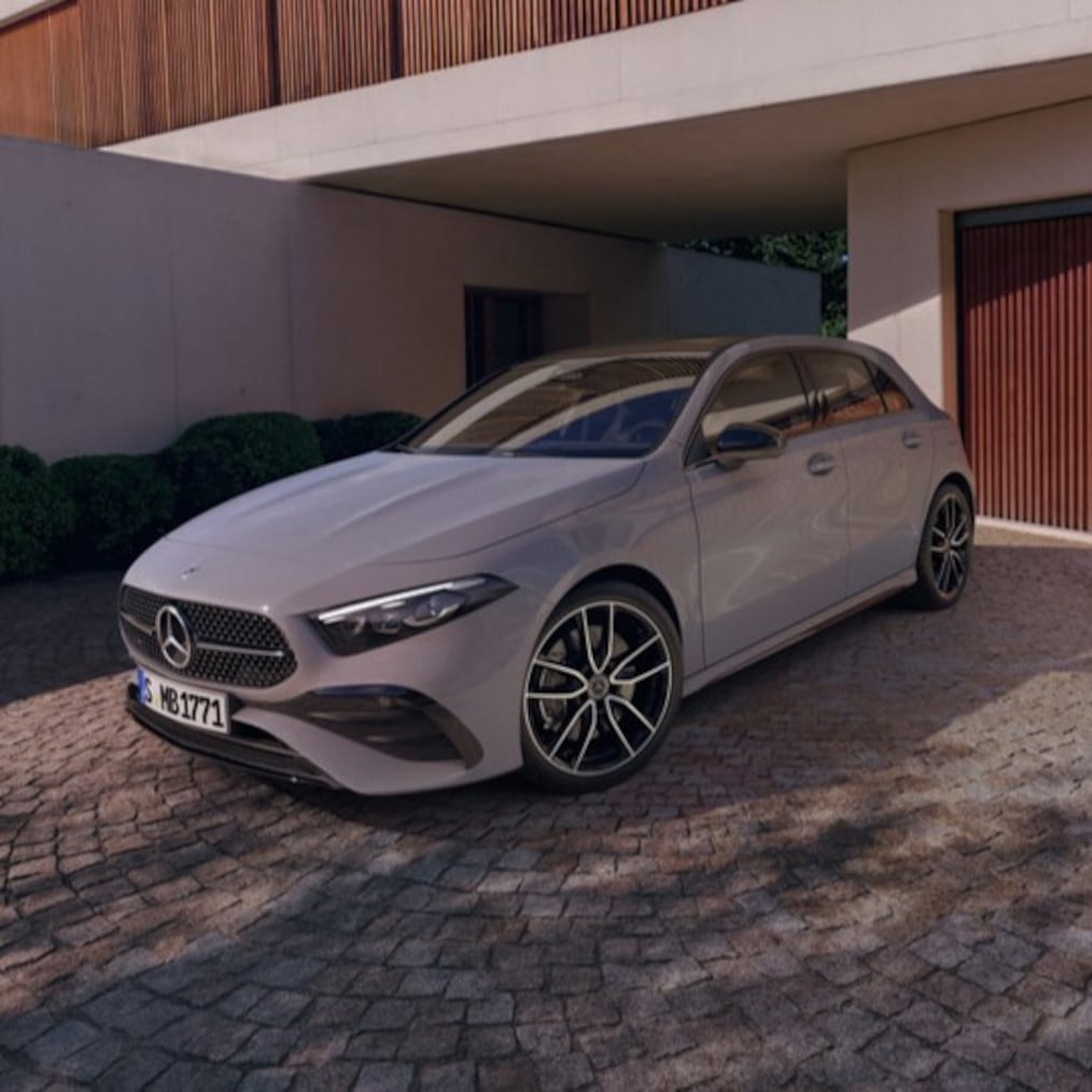 View of a Mercedes-Benz A 250 e with EQ hybrid technology standing at a charging station.