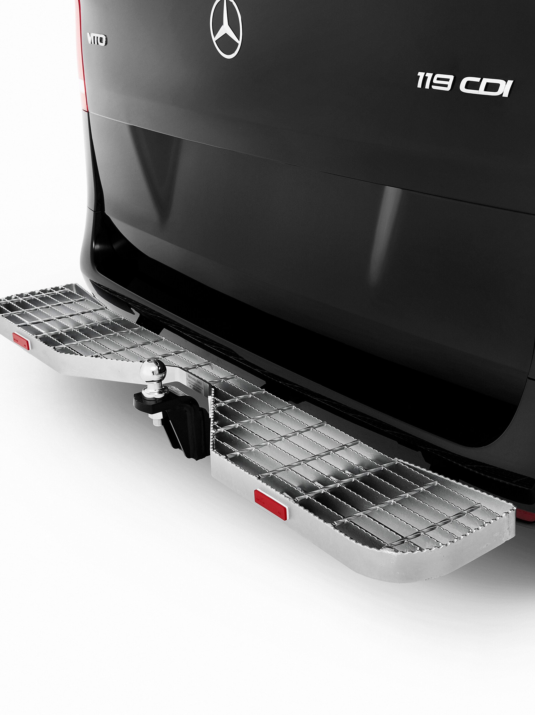 Rear technician step and towbar combination.